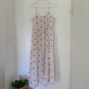 Chic White Maxi Dress with Red Floral Accents